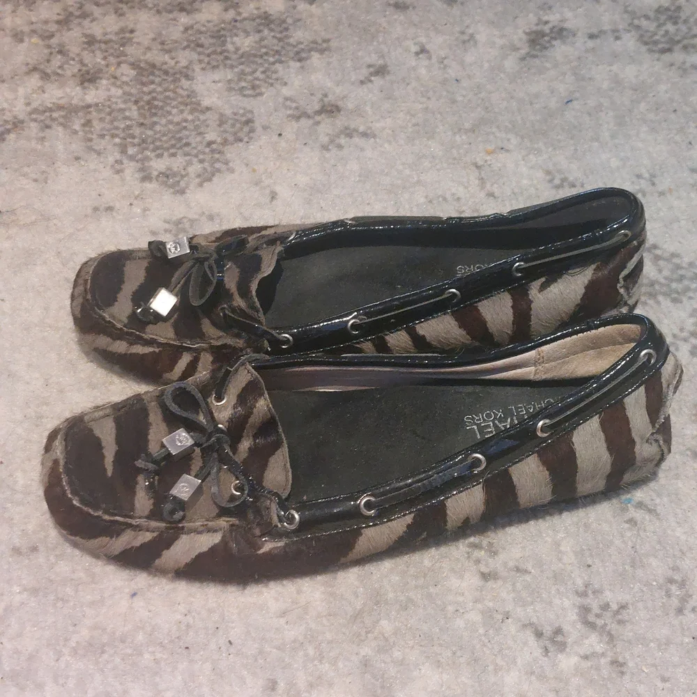 MICHAEL Michael Kors Brown and Beige Zebra-Print Moccasin Flats - Picture 2 of 5